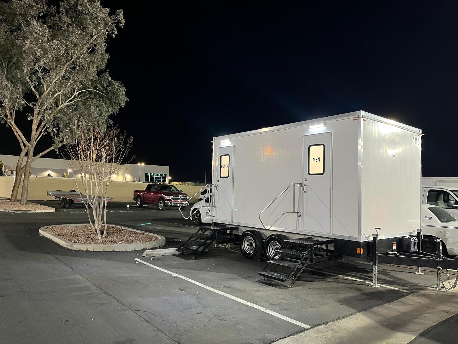 2 station restroom trailer staged at the parking lot, an Oregon restroom trailer rental job