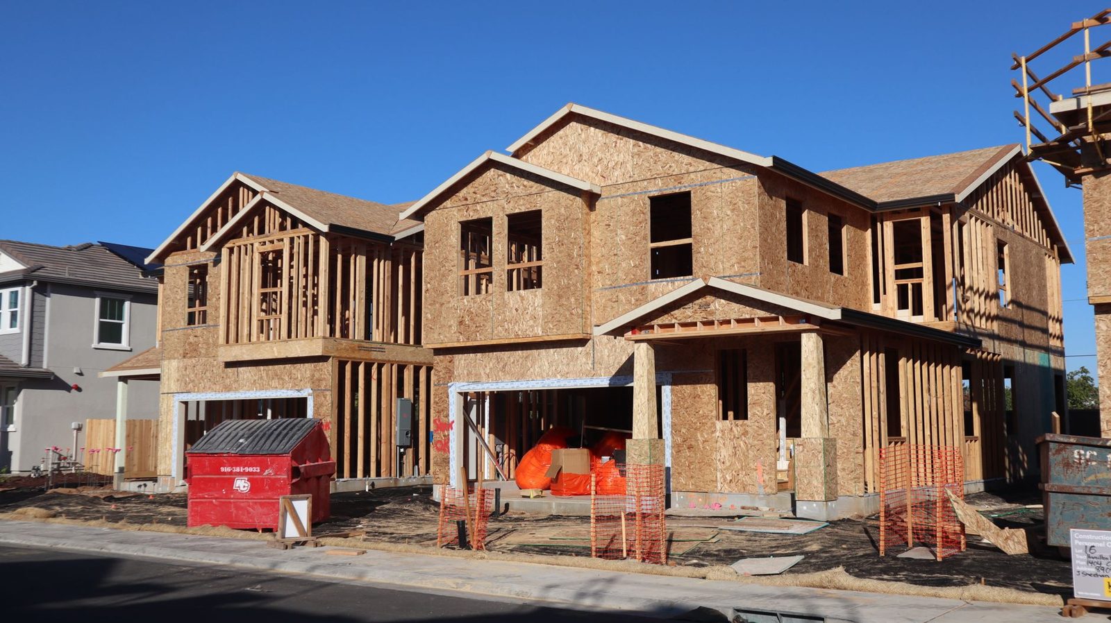 New wood framed homes going up on a residential street