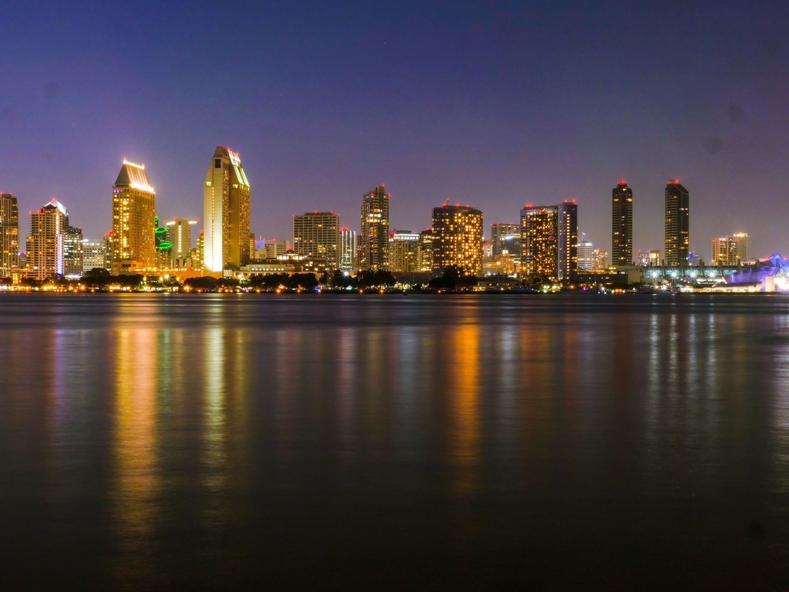 The San Diego skyline across the bay at night