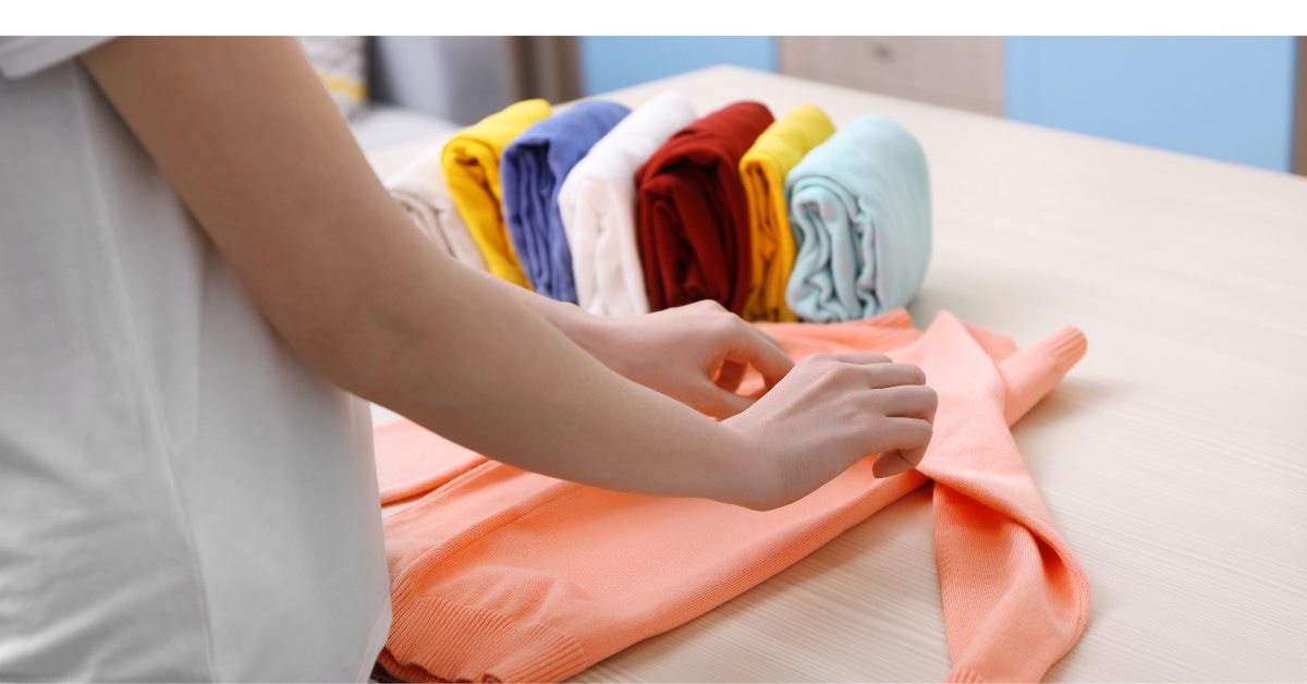 Freshly washed and folded crew clothing stacked in bright colors