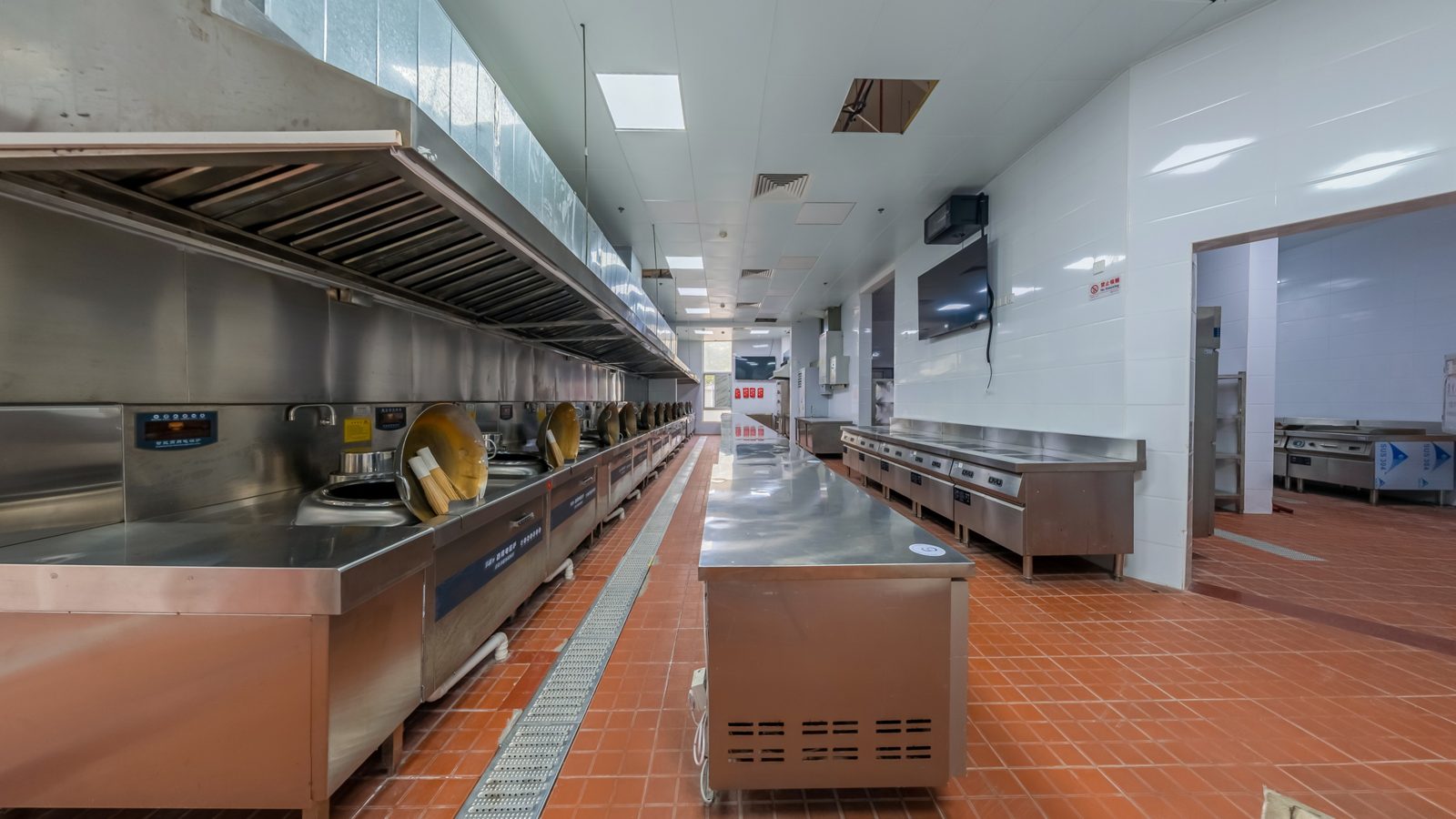 An empty stainless steel commercial kitchen