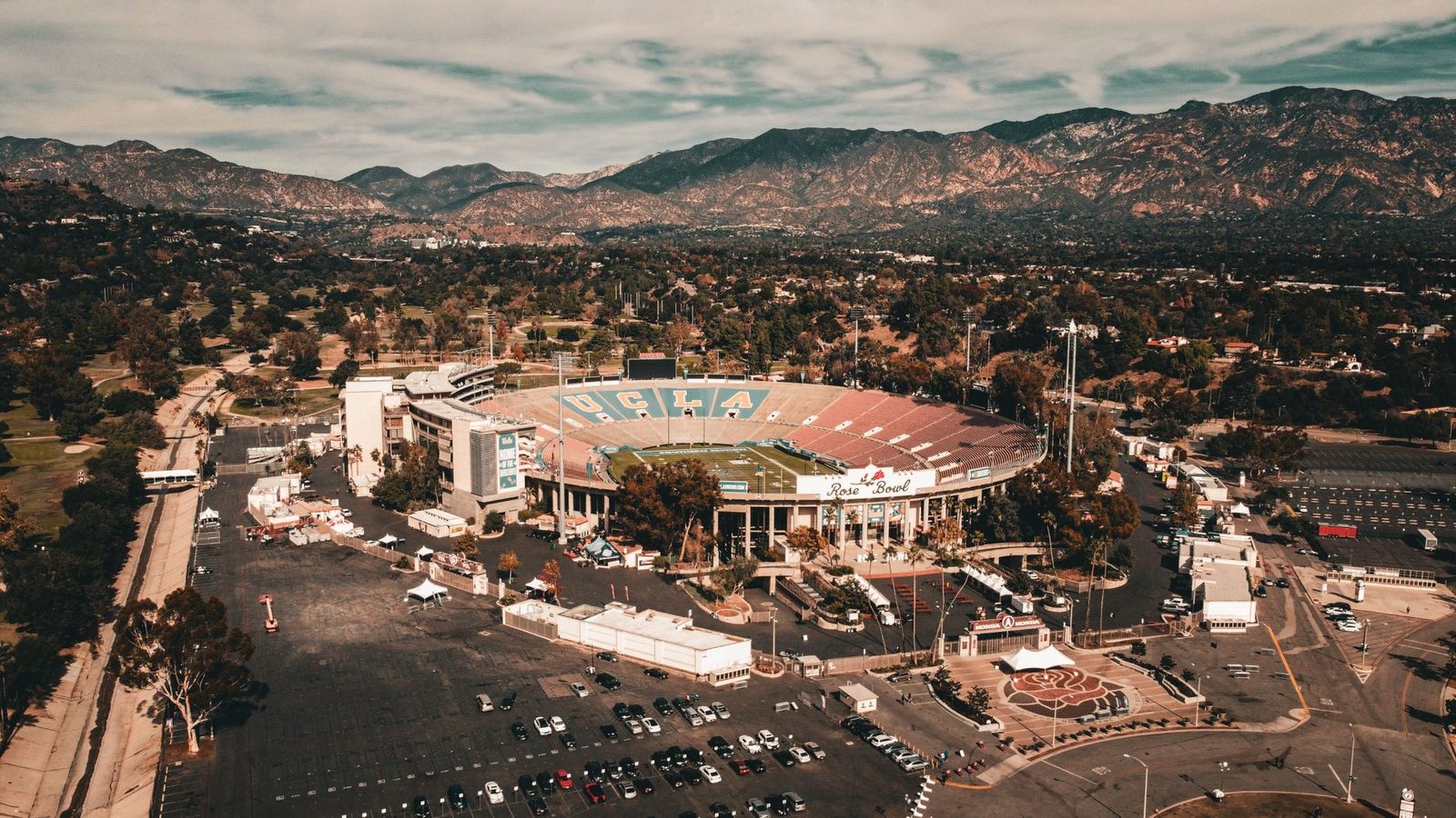 The Rose Bowl in Pasadena with the San Gabriel Mountains behind it