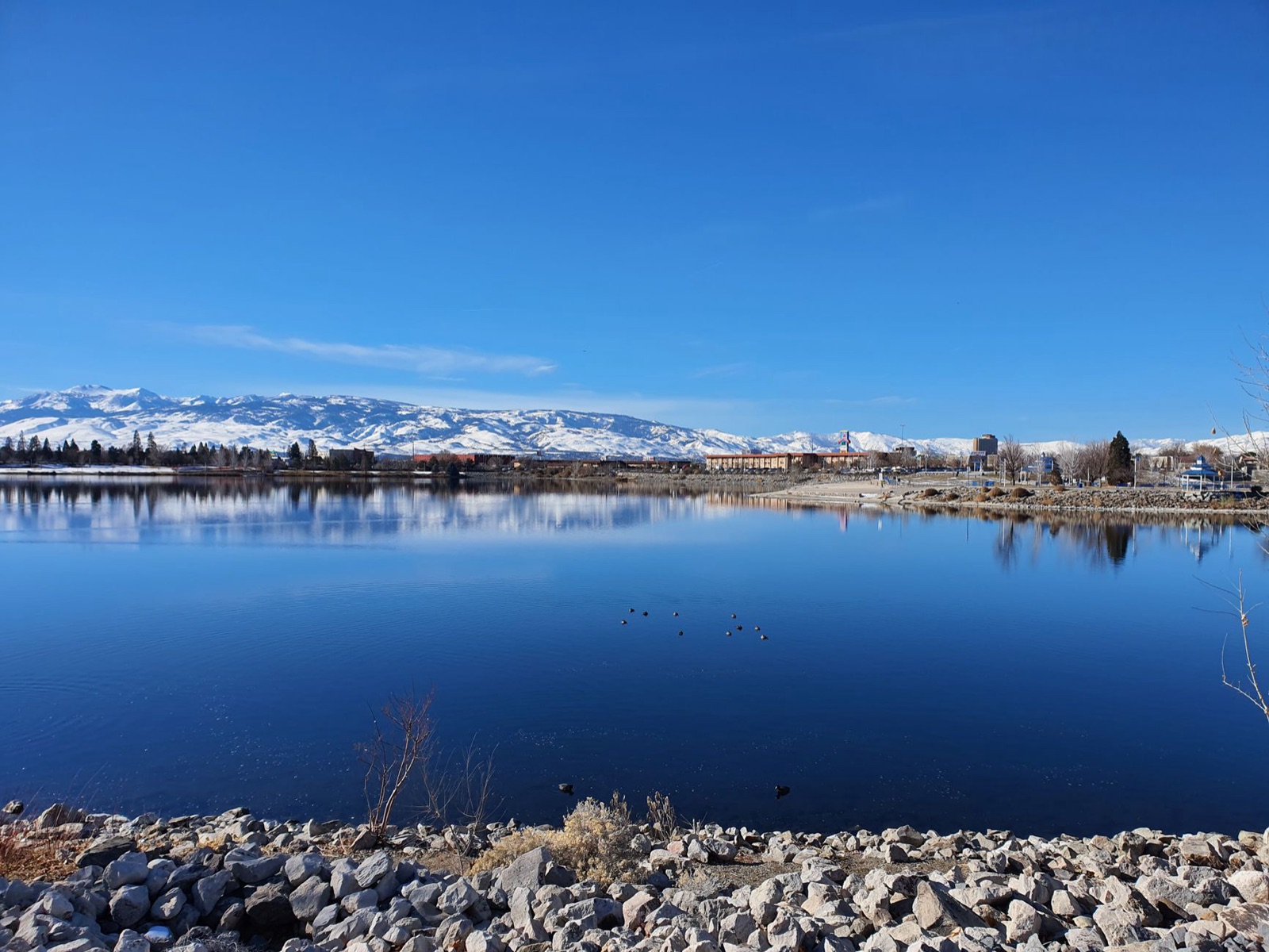 The Reno, Nevada skyline with the Sierra Nevada behind it