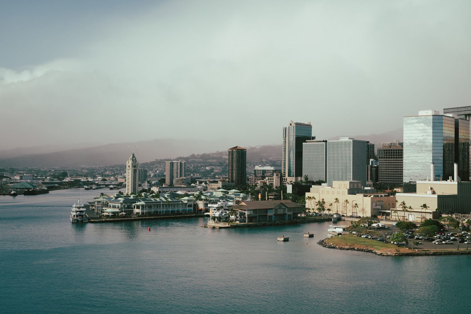 Downtown Honolulu towers and Aloha Tower above the harbor