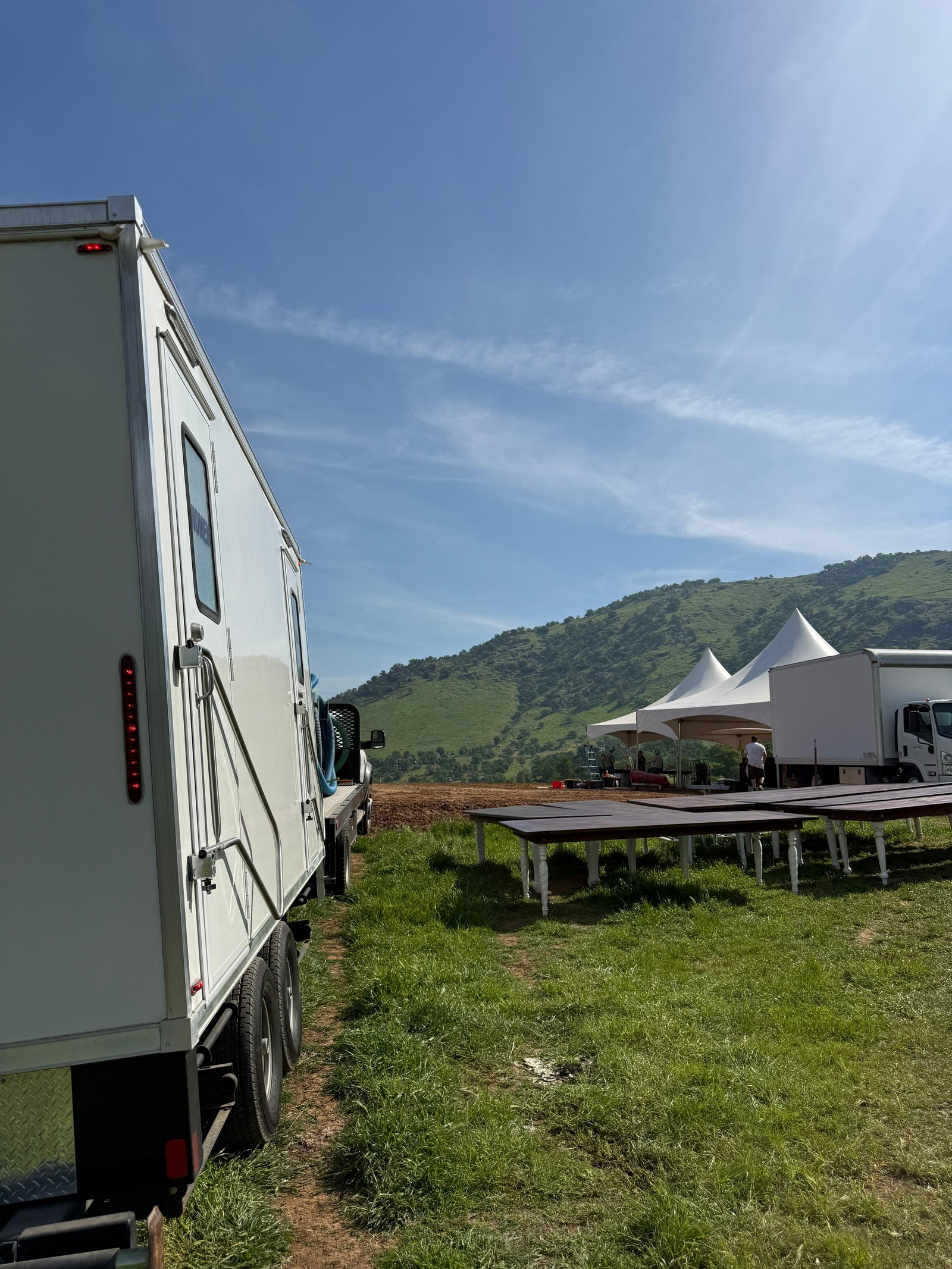 Shower trailer staged at the hillside venue, an Oregon shower trailer rental job